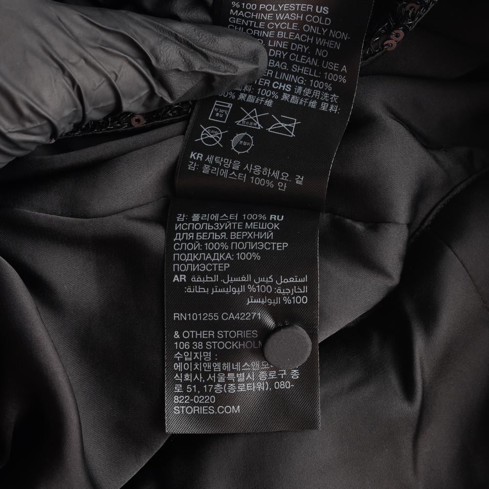 앤아더스토리즈 블랙 스팽글 홀터넥 민소매 백리스 블라우스 상세 이미지 7