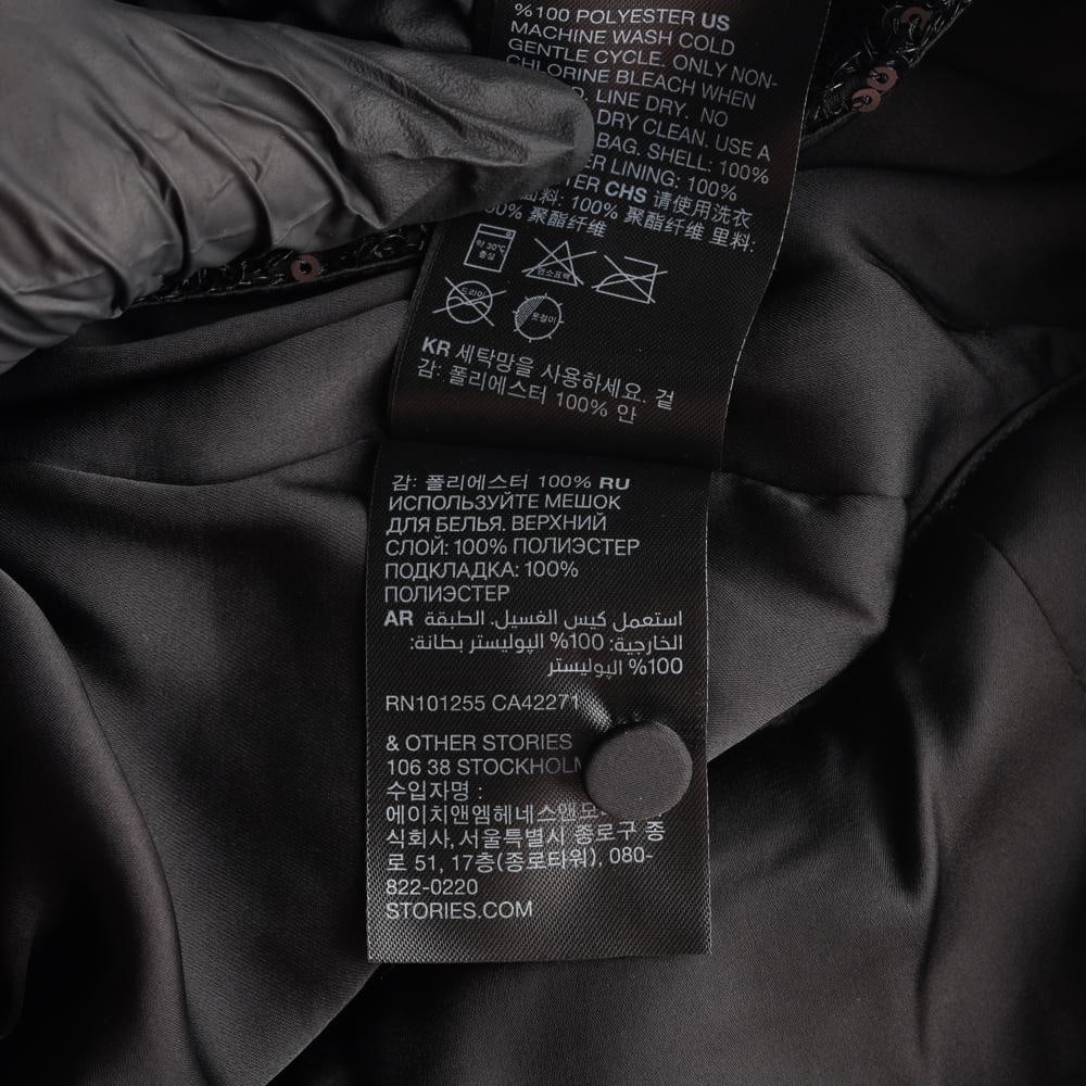 앤아더스토리즈 블랙 스팽글 홀터넥 민소매 백리스 블라우스 이미지 7