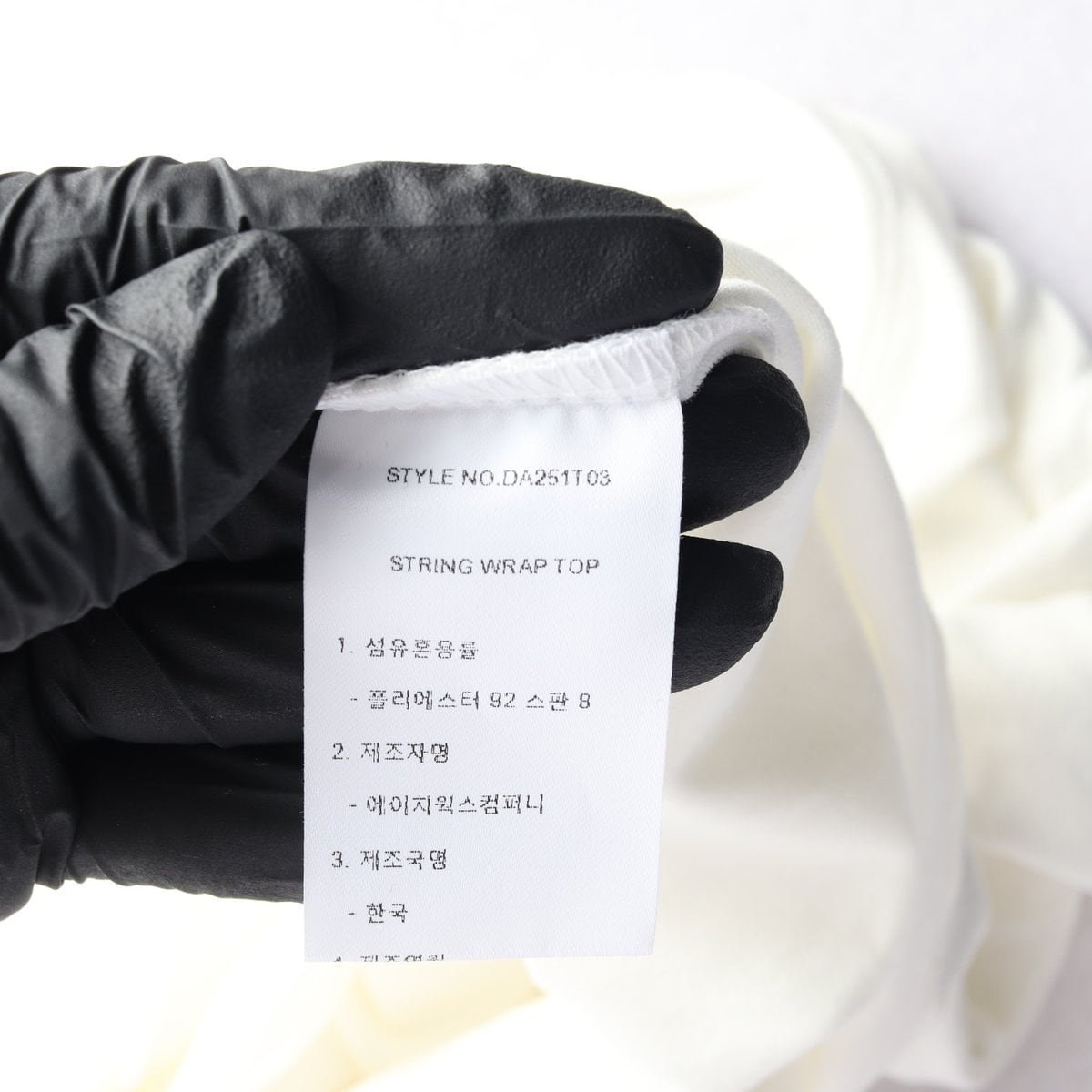 (새상품)다이애그널 25SS 화이트 스트링 랩 탑 긴팔 블라우스 상세 이미지 6