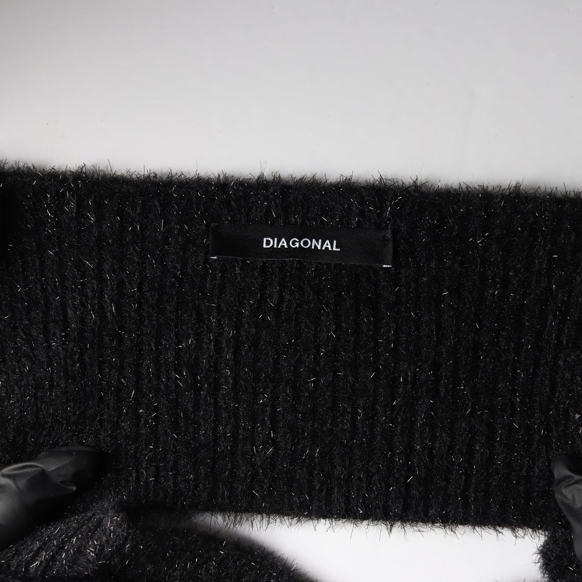 다이애그널 22FW 홀리데이 니트 슬리브리스 탑 상세 이미지 3