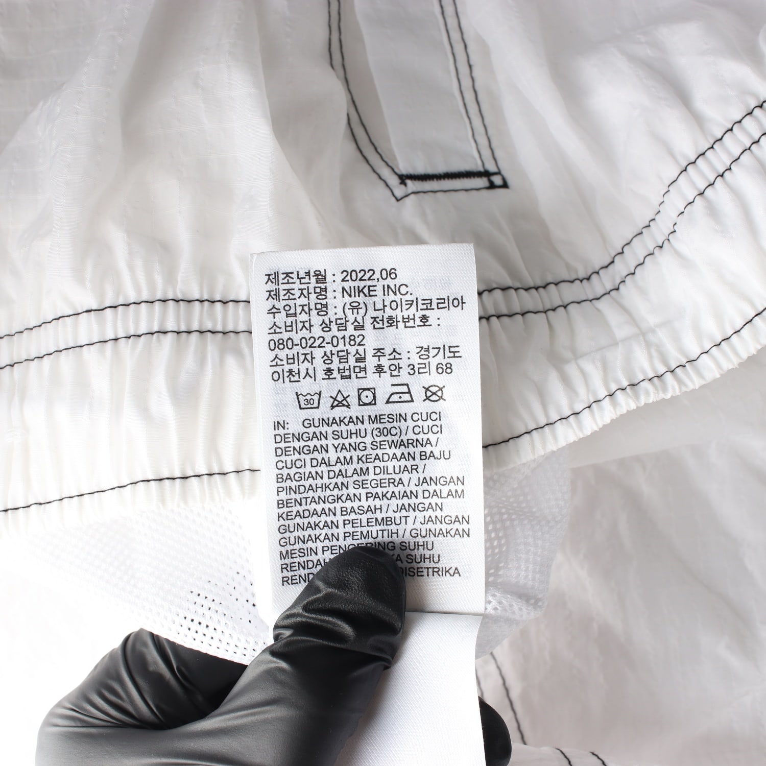 나이키 22FW 우먼스 스우시 리펠 하이라이즈 우븐 트레이닝 팬츠 이미지 8
