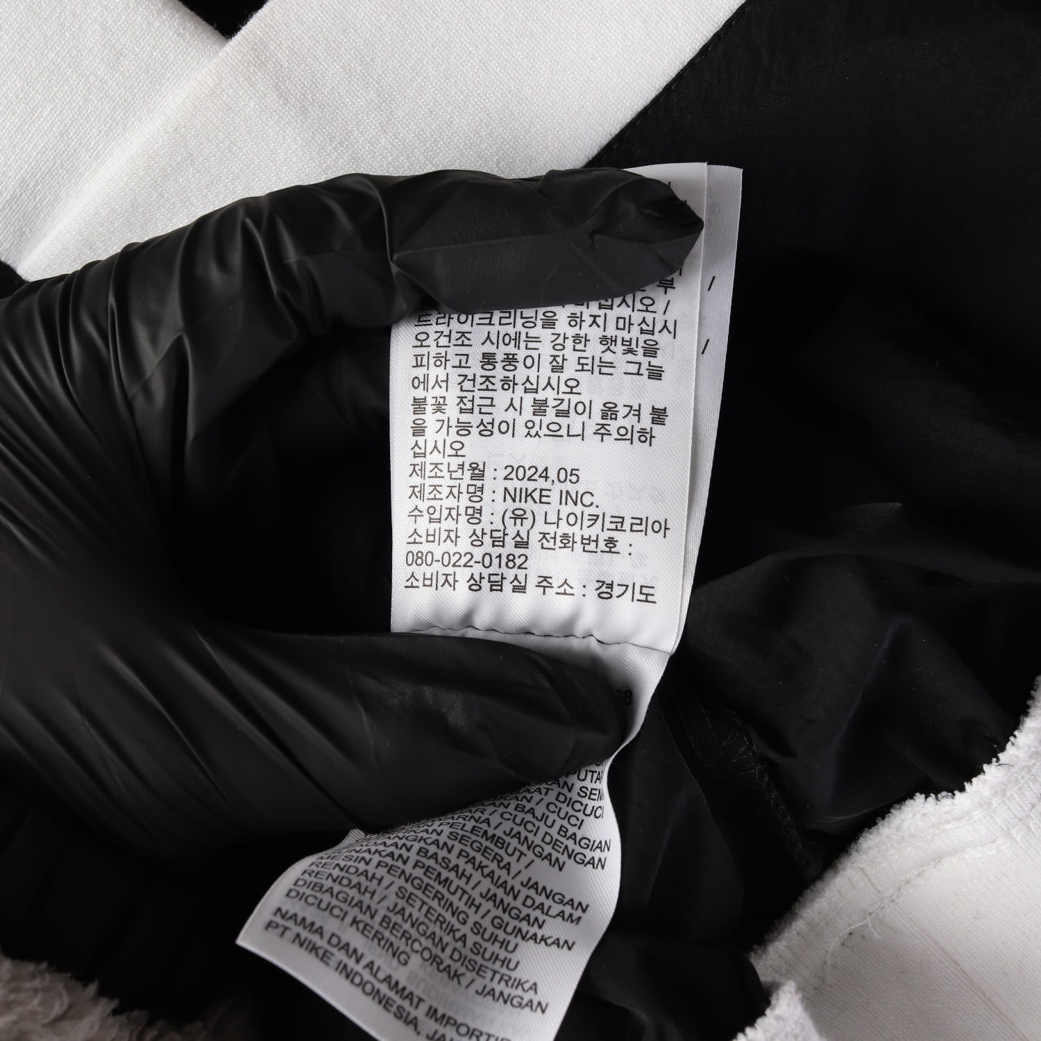 나이키 24SS 에센셜 루즈 UV 우븐 긴팔 티셔츠 브이넥 탑 이미지 5