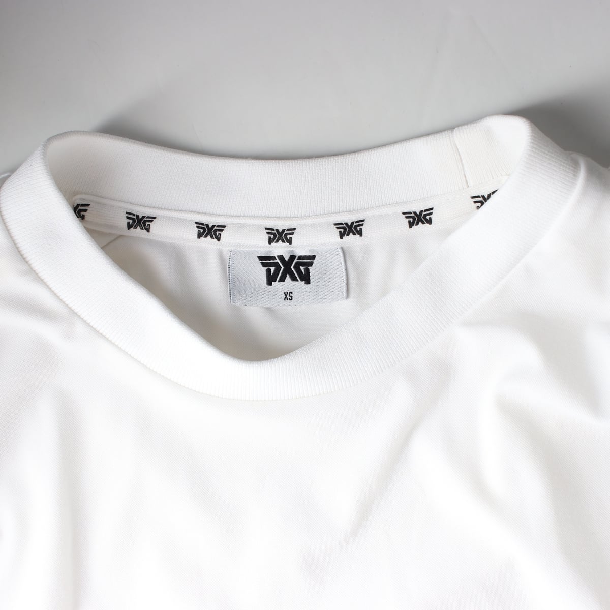 피엑스지 PXG 23SS 로고 프린팅 슬리브리스 나시 탑 상세 이미지 3
