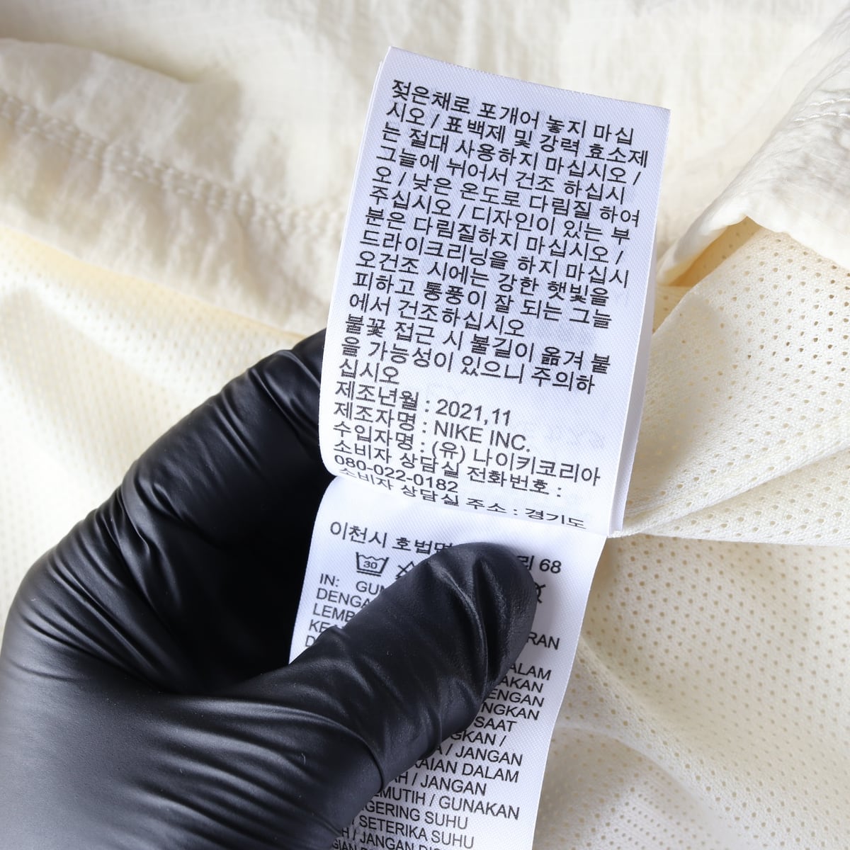 나이키 22SS 로고 프린트 메쉬 하프집 아노락 상세 이미지 6