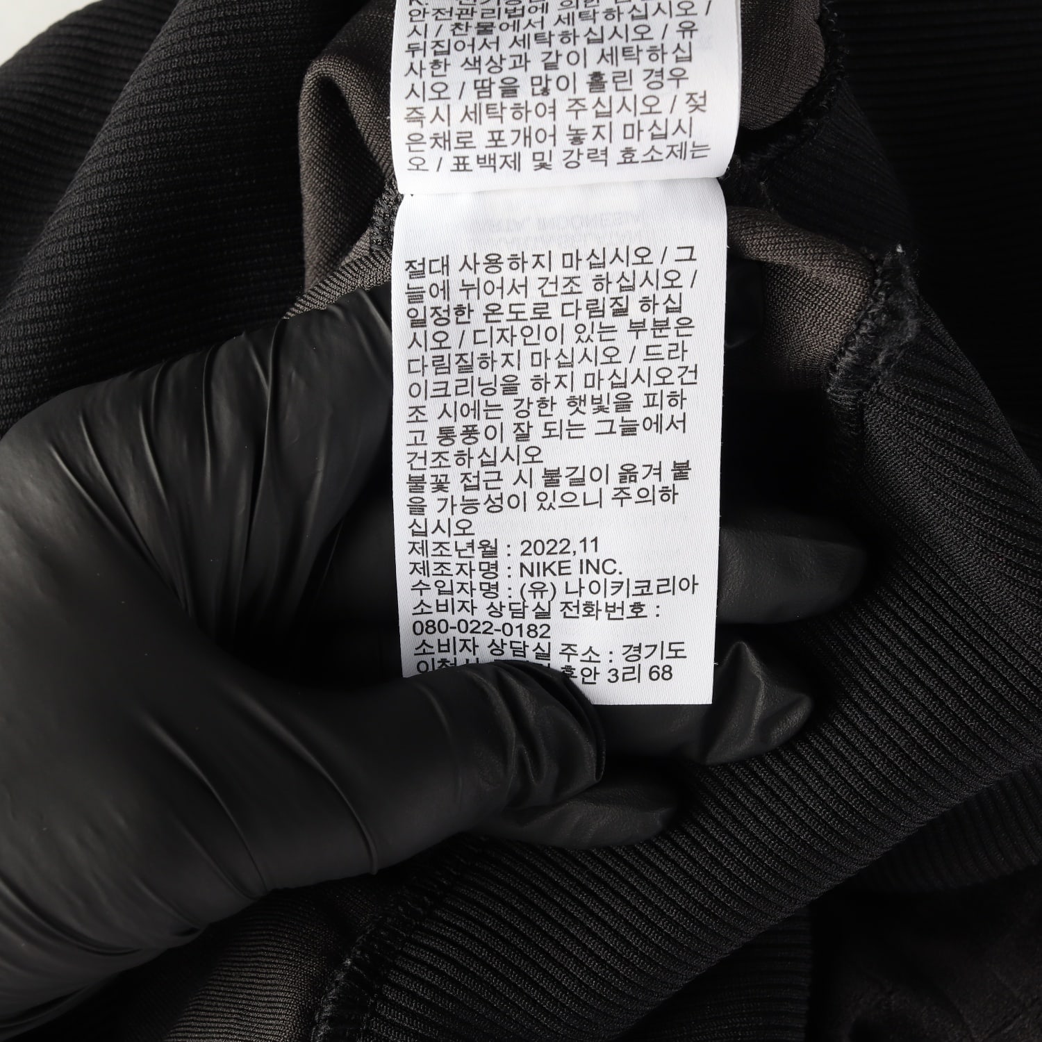 나이키 22FW 체크 패턴 크롭 긴팔 카라 티셔츠 이미지 6